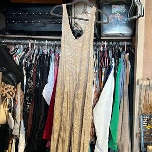 Waiwaolani romper in Makahiki Brown size medium. 100% rayon made in Indonesia.